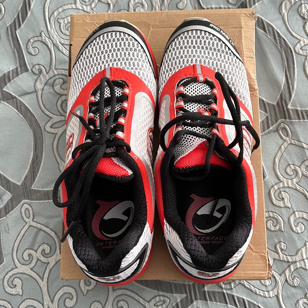 Orange, white and black Pearl Izumi running shoes!
